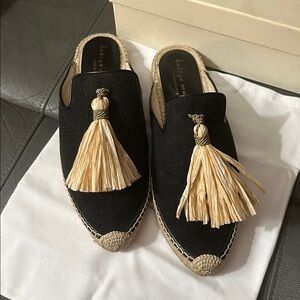 Bettye Muller Rabat linen mules featuring a raffia tassel